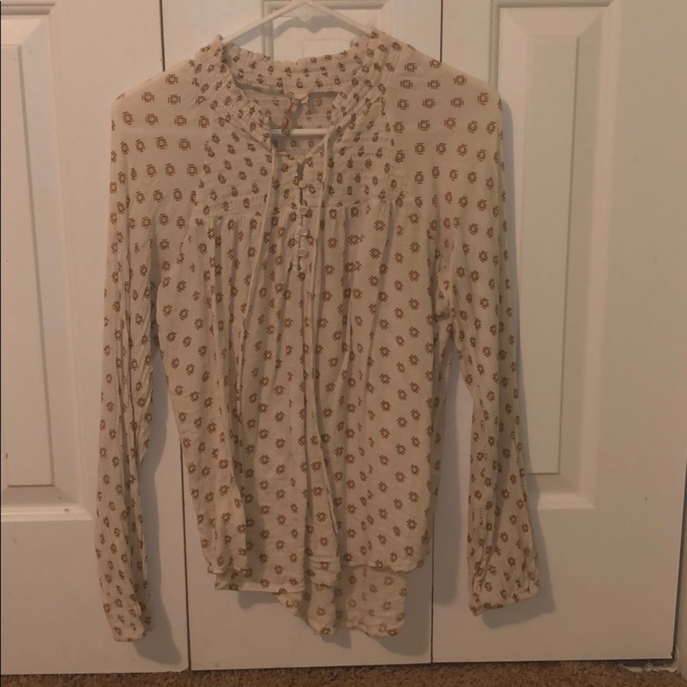 Brown and cream pattern shirt